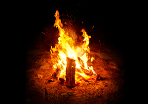 Camping Fire. A warm glowing camp fire at night.