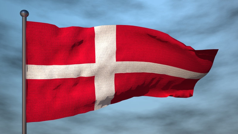 3D Flag of Denmark on sky background